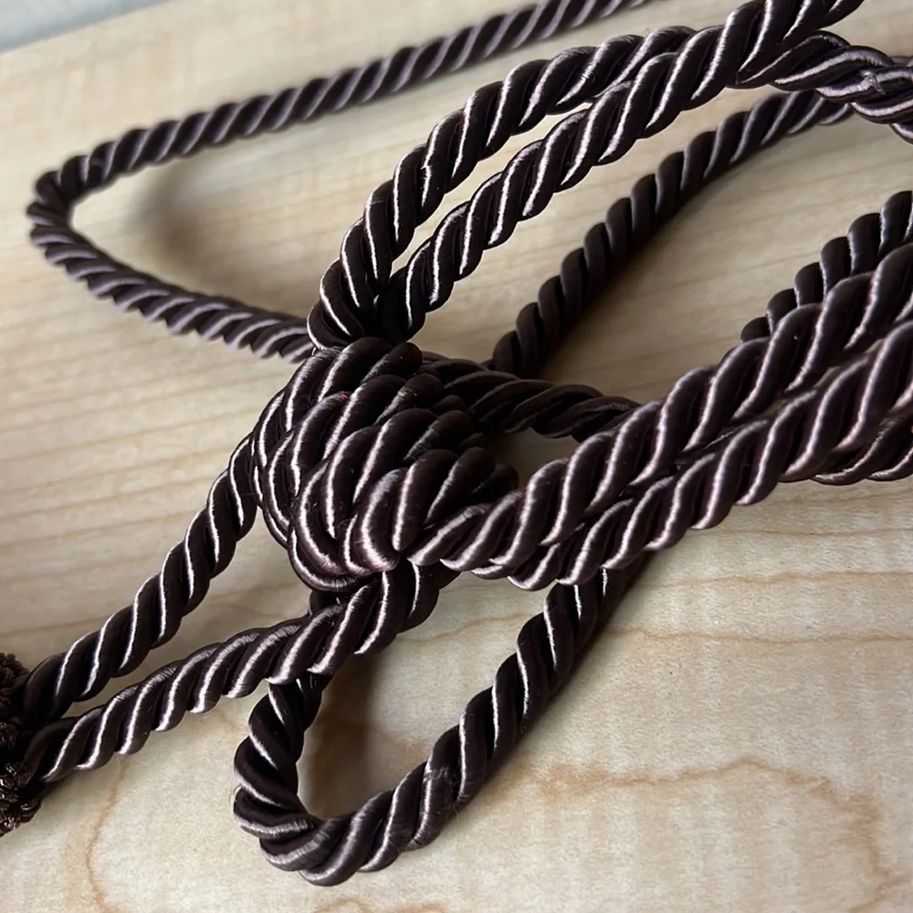 Set of 2 brown curtain tie tassels with copper beads detail approx 24” like new